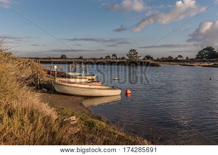 Boats on Auzance river in Brem-sur-mer, France