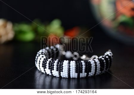Handmade Beaded Bracelet Like Piano Keyboard On A Dark Background