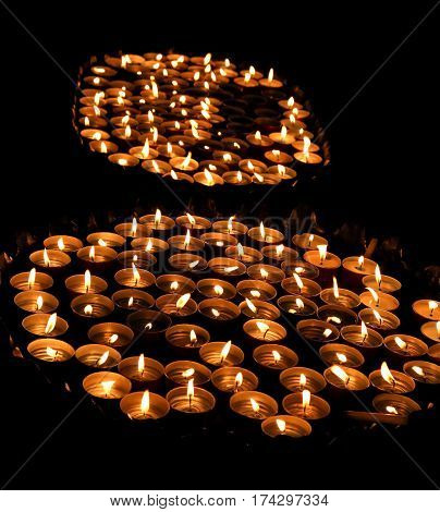 Candles Lit With The Warm Flame During The Religious Ceremony