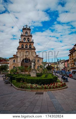 Church Of The Assumption In Cangas De Onis, Asturias,  Spain And Statue Of Don Pelayo, First King Of