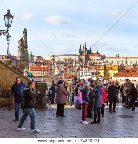 Prague, Czech Republic - February 25, 2017: People at panorama viewpoint and famous landmarks of Prague panoramic view
