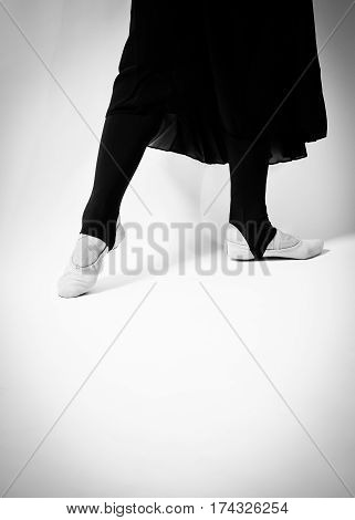 black and white photo of ballet dancer on a white background