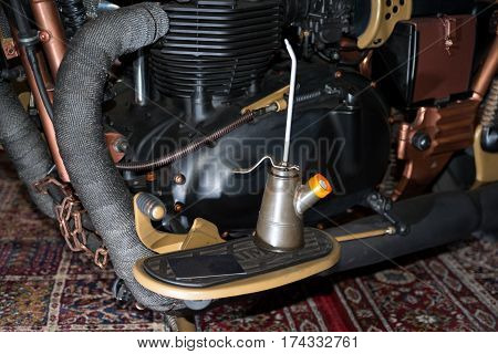 Particular of an old motorcycle engine with exaust