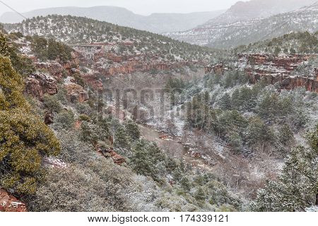 a winter snowstorm in scenic oak creek canyon Sedona Arizona