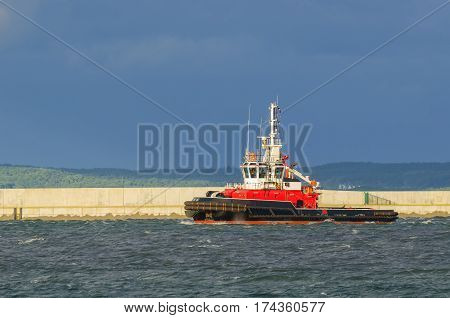 FIREBOAT - Fireboat before the breakwater in harbor basin