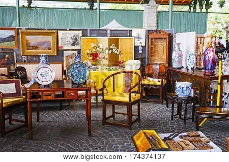 Montreux Switzerland - May 25 2013: Furniture paintings and other stuff offered for sale during a cyclical event which takes place in the famous Covered Market