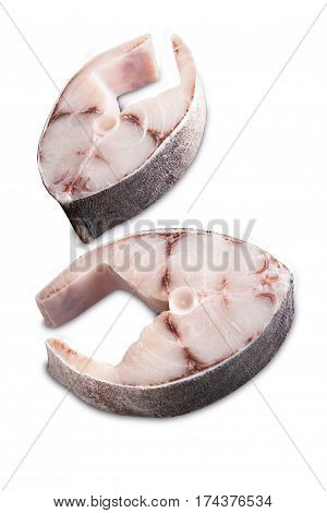 Two steaks of cobia on a white background