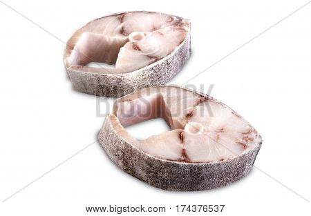 Two steaks of cobia on a white background