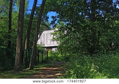 Old former german wooden building in the Morskoe (Pillkoppen) village in the Curonian Spit National Park. Russia.