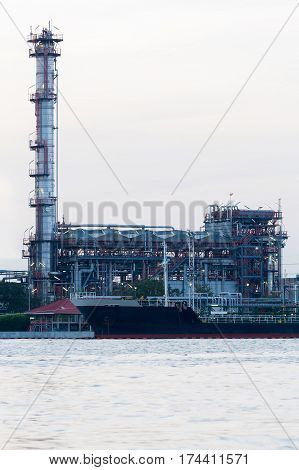 Oil refinery power plant river front industiral landscape background