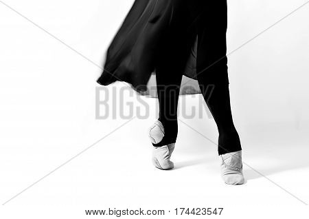 black and white photo of ballet dancer on white background