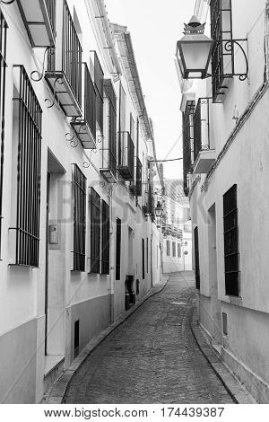Cordoba (Andalucia Spain): old typical street in the Juderia. Black and white