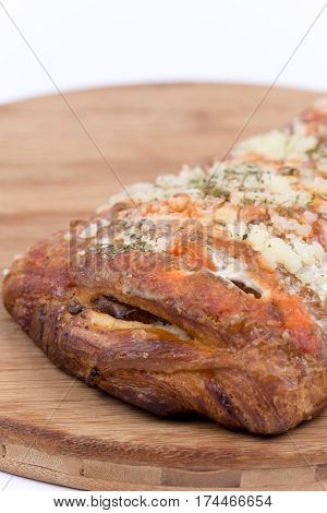 Pizza Sandwich On Wooden Board Over White