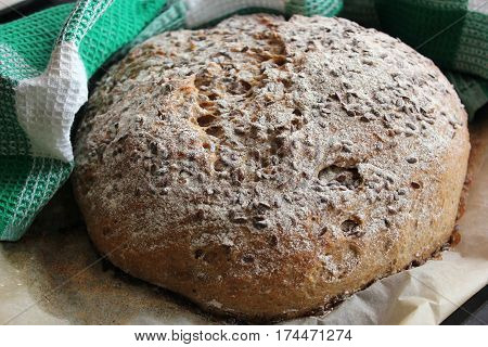 Bread on the table. Detail of fresh traditionally baked bread. Bakery, cooking concept.