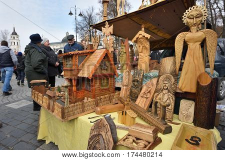 VILNIUS LITHUANIA - MARCH 4: Traditional Lithuanian wood sculptures in annual traditional crafts fair - Kaziuko fair on March 4 2017 in Vilnius Lithuania