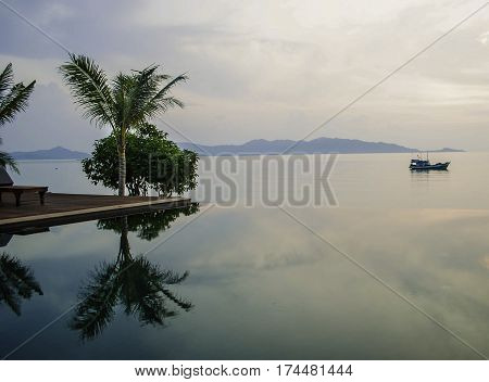 a swimming pool with a beautiful outlook of the ocean