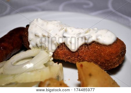 Beautifully decorated with the white plate of homemade dishes. Kara