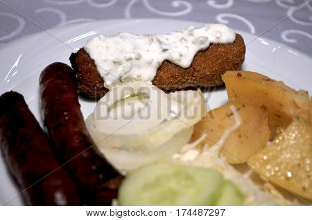 Beautifully decorated with the white plate of homemade dishes. Kara