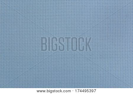 Close-up view of the blue linen fabric. Texture for the background