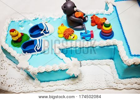 Birthday cake in the shape of number one.