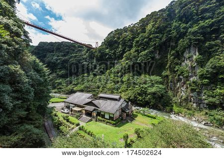 Beautiful Valley And Japanese House In Kamikawa Otaki Waterfall Park, Kagoshima, Kyushu, Japan