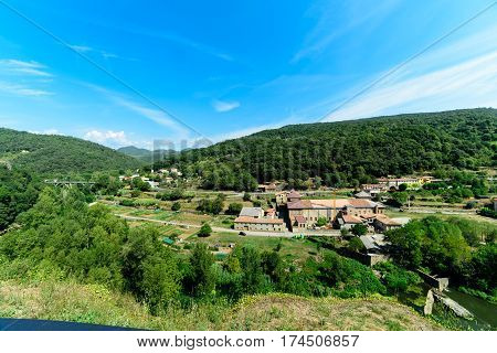 Castellfollit de la Roca, The village's narrow alleys lead to the old church of Sant Salvador, on the edge of the cliff, where there is a viewpoint with wonderful views.