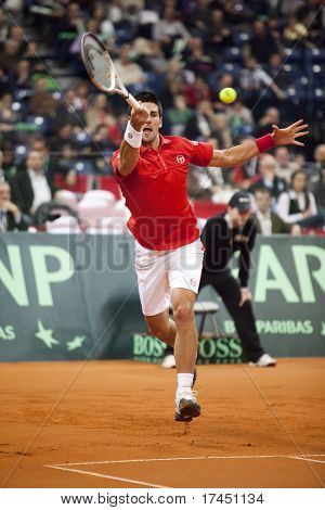 BELGRADE, SERBIA - MARCH 7: Novak Djokovic plays against John Isner in the Davis Cup 2010 on March 7, 2010 in Belgrade, Serbia.
