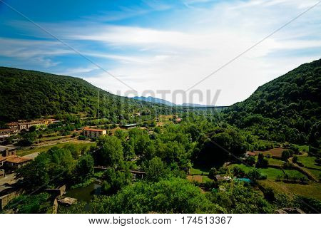 Castellfollit de la Roca, The village's narrow alleys lead to the old church of Sant Salvador, on the edge of the cliff, where there is a viewpoint with wonderful views.