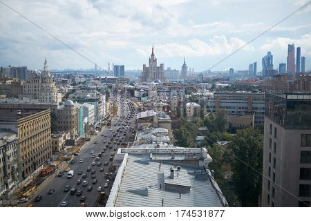MOSCOW, RUSSIA - JUL 7, 2016: Daytime cars traffic and reconstruction of sidewalks at Garden Ring. Garden Ring is circular main street in the center of Moscow. Length - 15.6 km, width - 60-70 m.
