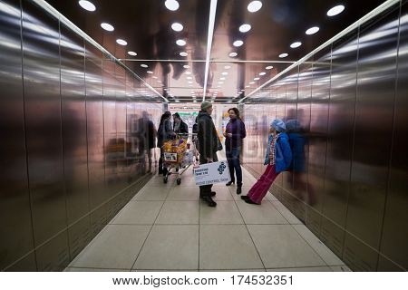 MOSCOW, RUSSIA - APR 02, 2016: Elevator cabin with passengers in Aviapark trade center at Hodynskiy boulevard. Aviapark total area of 390 000 sq.m., shopping area - 230 000 sq.m.