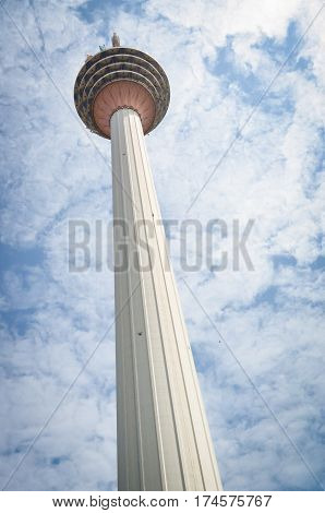 menara tv tower in kuala lumpur, malaysia with blue sky
