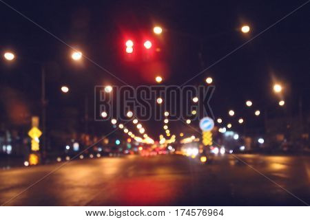 Bokeh traffic light on the road for background