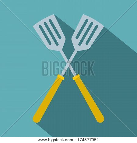 Crossed metal spatulas icon. Flat illustration of crossed metal spatulas vector icon for web isolated on baby blue background