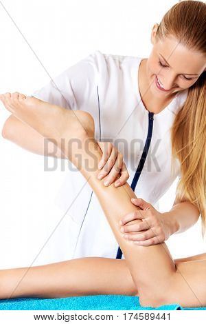 Woman having massage of body in the spa salon. Beauty treatment concept.