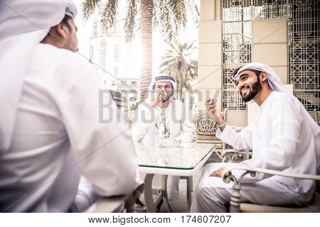 arabic business men spending time in Dubai