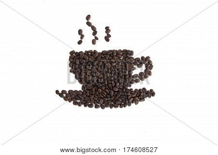 Roasted coffee beans placed in the shape of a cup and saucer on a white surface