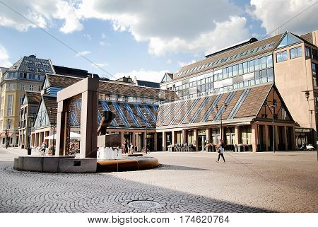 Oslo Norway - July 22 2014: The fountain in the square Christiania June 26 2012 in Oslo Norway. Area Christiania in Oslo is one of the most visited places in the city.