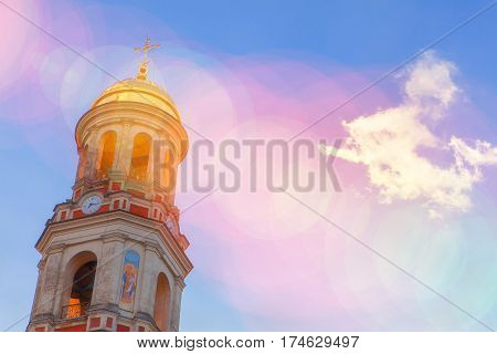 golden church cupola shining  in sun light