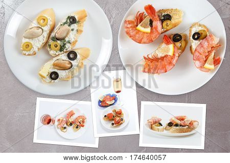 Beautiful snapshots of various italian sandwiches with seafood arranged on rustic wooden background with plates with food and seashells with copy space horizontal top view.