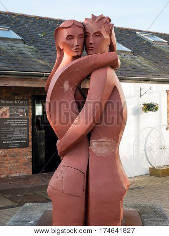 GRETNA GREEN, SCOTLAND - 21 JAN. 2017: Sculpture of a couple embracing at Gretna Green, the town on the Scottish border where eloped couples get married