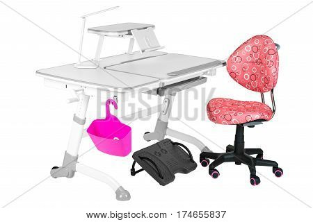 Pink chair gray school table pink basket desk lamp and black support under legs on the white isolated background.