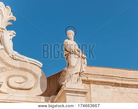 Statue in front of the Cathedral of Syracuse Sicily Italy