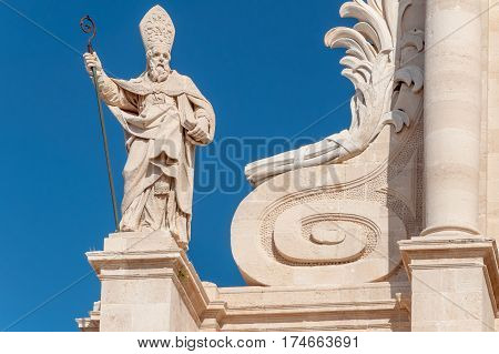 Statue in front of the Cathedral of Syracuse Sicily Italy