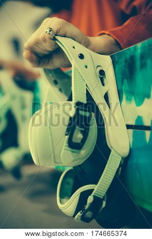 Snowboard Repair Shop Worker Adjust The Bindings