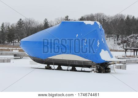 Shrink wrap on boats, on dry land during the winter season as protection against elements.