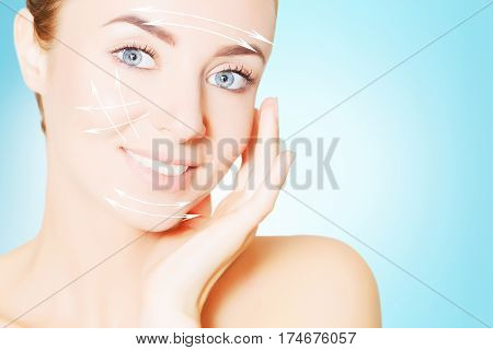 renovating skin . woman face portrait with lifting marks