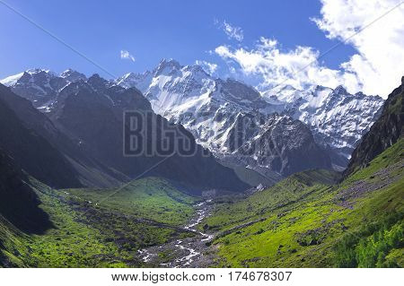 snowy mountain peaks and green valleys Caucasus