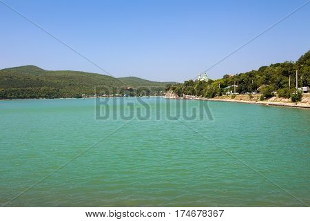 Scenin view of Abrau-Durso lake in Caucasus mountains.