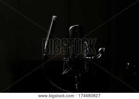 Professional Microphone in Recording Studio Professional Studio Background with space for text