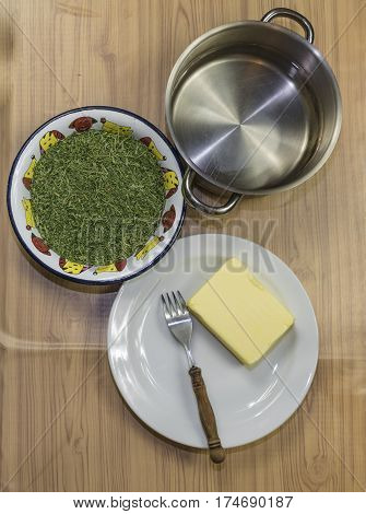 Medical Marijuana Leafs Butter Cooking With Water